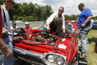 Illustration for article titled '63 Thunderbird Race Car + BMW V12 + Ammo-Can Intake = WIN!